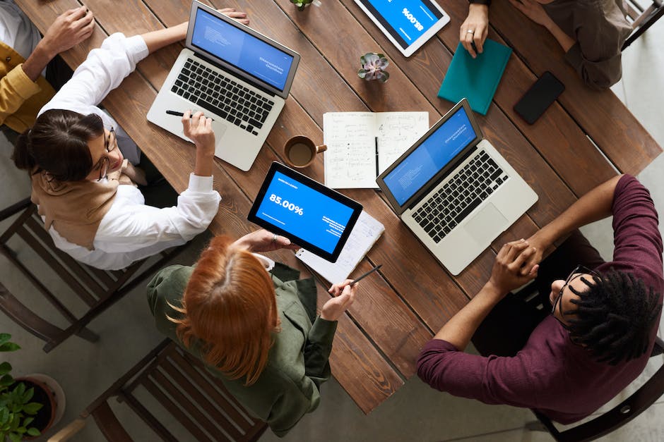 A diverse group of people using digital devices to search for products online