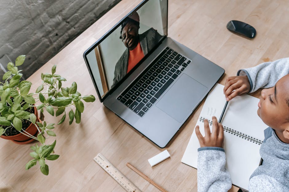 An online tutor conducting a lesson via video call with a student