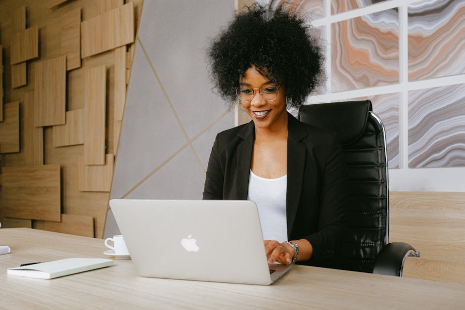 A freelancer working diligently on their laptop, with a satisfied smile, surrounded by icons representing success on digital freelance platforms.